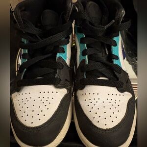 Kids Air Jordan Nike Black and White Sneakers with blue trim